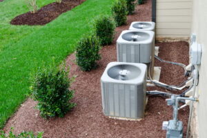 air-conditioner-units-near-grass