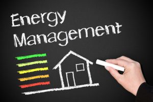 hand-drawing-house-on-a-chalkboard-with-the-words-energy-management