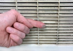 finger-wiping-dust-from-HVAC-vent